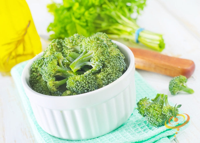 Fresh green broccoli from SeedsNow, showcasing vibrant florets and sturdy stalks in a natural, close-up view.