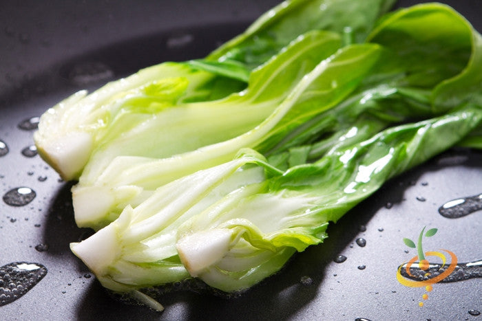 Fresh green Bok Choy cabbage from SeedsNow, showing leafy Chinese Pak Choi with crisp stalks and dark green leaves.