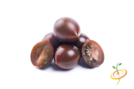 Black Cherry Tomato fruits whole and halved showing rich dark color and juicy interior